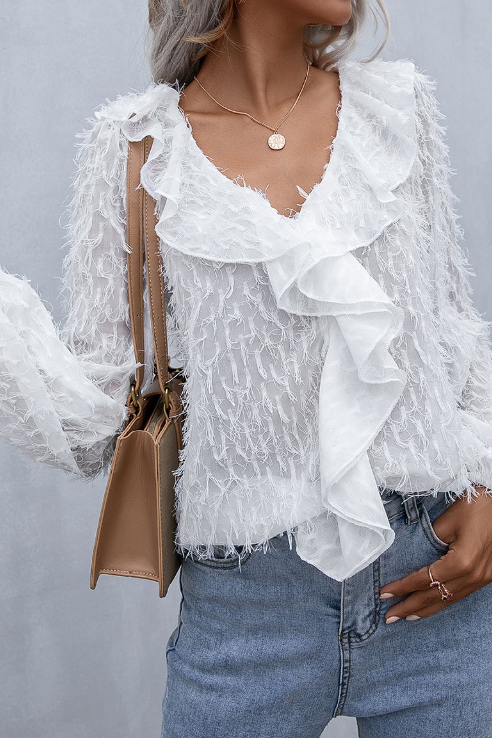 Evelyn Ruffle Hem Fringe Blouse