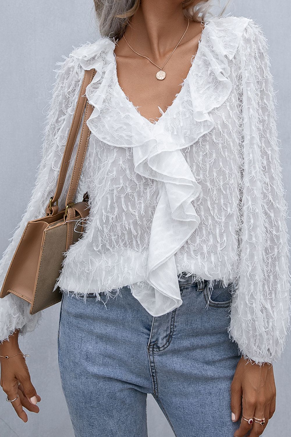 Evelyn Ruffle Hem Fringe Blouse